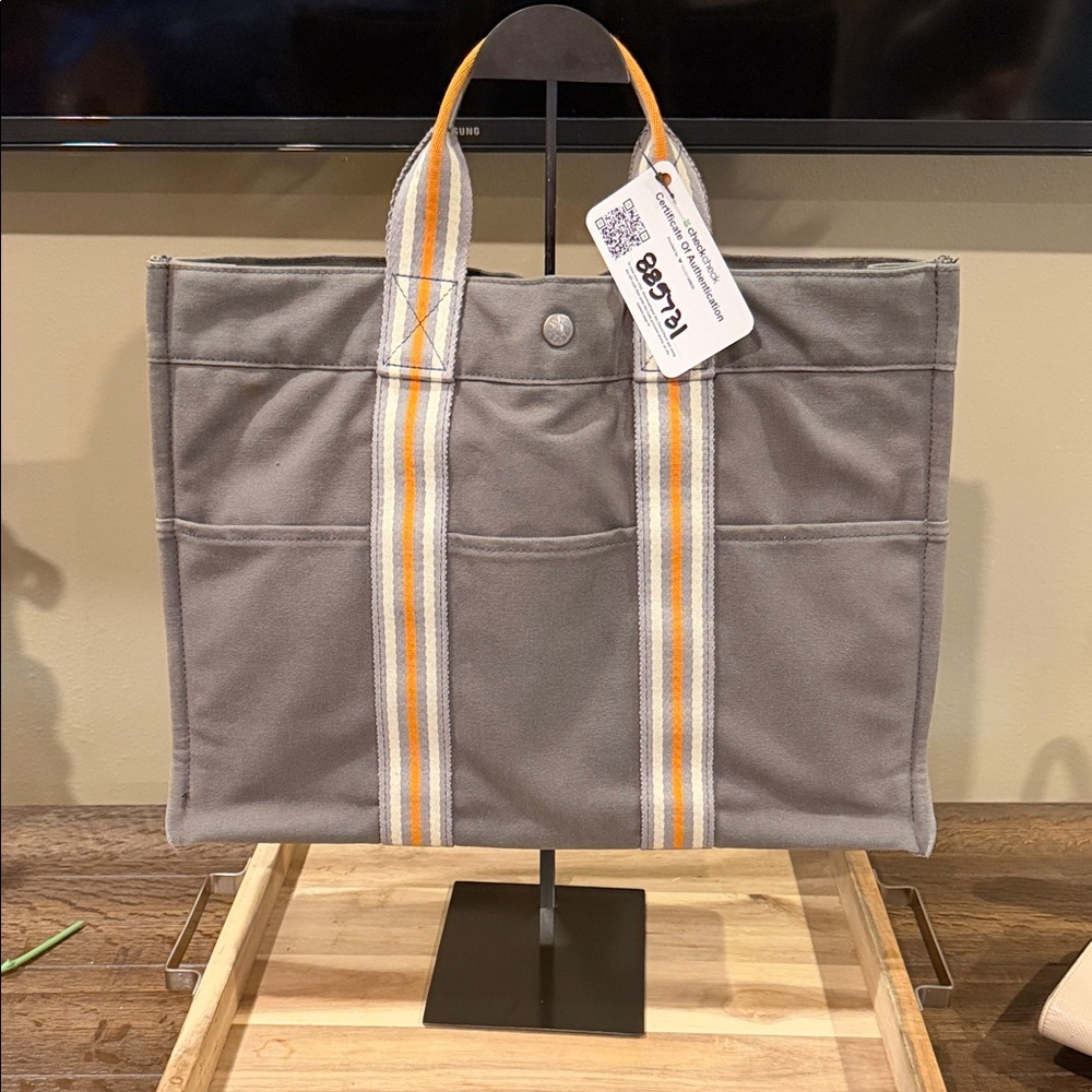 Hermès Ginza Limited Fourre Tout MM tote bag in gray canvas with orange stripe